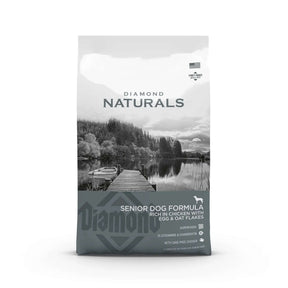 Diamond Naturals Senior Dog Formula Rich in Chicken with Eggs and Oat Flakes Dry Dog Food bag on a scenic background.