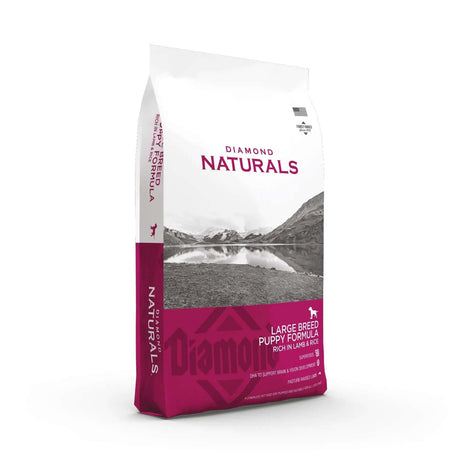 Diamond Naturals Large Breed Puppy Formula Rich in Lamb and Rice Dry Dog Food bag with nature background.