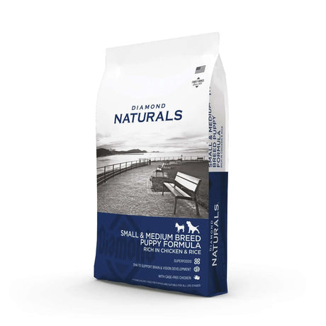 Diamond Naturals Small and Medium Breed Puppy Formula Rich in Chicken and Rice Dry Dog Food package on a table.