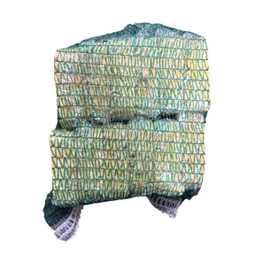 Elaine's Birding Grub Suet Slab in green netting, providing energy and nutrition for wild birds.
