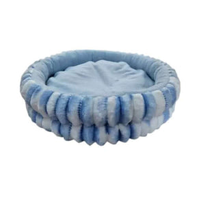Plush Sleeper Fur Pod in blue, round pet bed made of ultra-soft plush fabric for cats and small dogs.