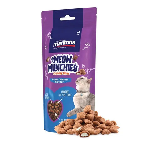 Meow Munchies Crunchy Cat Treats in Roast Chicken flavour with a pile of bites. Healthy, soya-free cat treats from Marltons.