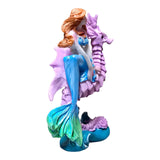 Mermaid with Seahorse Ornament featuring a detailed mermaid figure holding a seahorse, ideal for aquarium decoration.