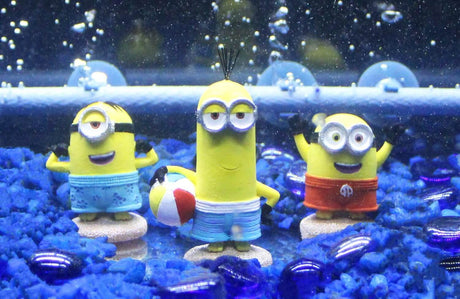 Penn-Plax Minions Officially Licensed trio of Minion figurines with beach theme in aquarium setting.