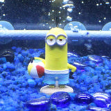 Penn-Plax Minions Officially Licensed beach-themed aquarium ornament featuring a Minion holding a beach ball.