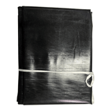 Pond Liner Sheet rolled and secured with a ribbon, ideal for waterproof pond construction.