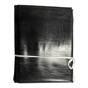 Pond Liner Sheet rolled and secured with a ribbon, ideal for waterproof pond construction.