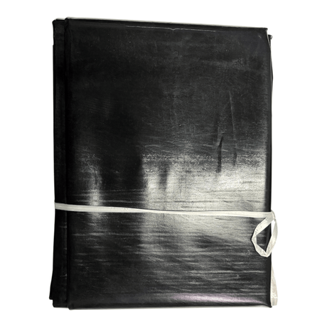 Pond Liner Sheet rolled and secured with a ribbon, ideal for waterproof pond construction.