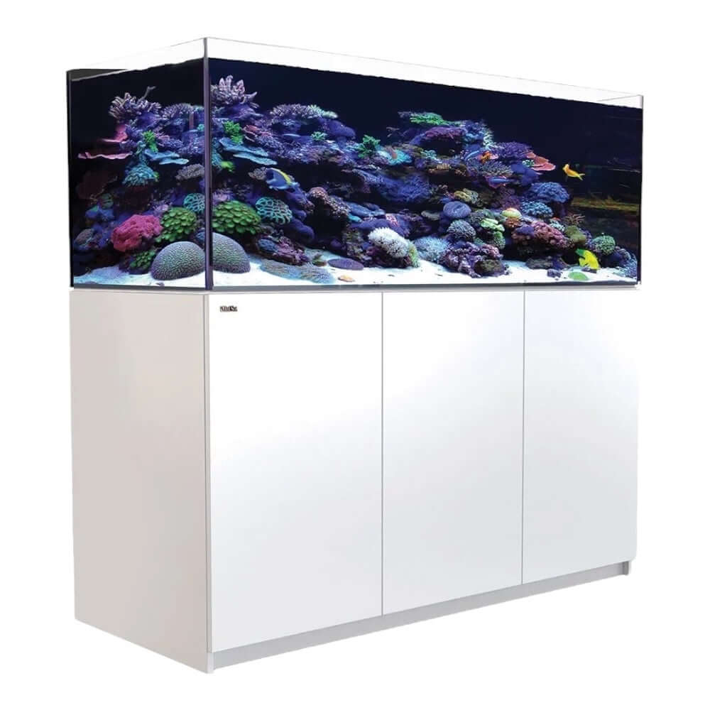 Red Sea Reefer G2+ 525 Aquarium featuring vibrant corals and a modern white cabinet design.