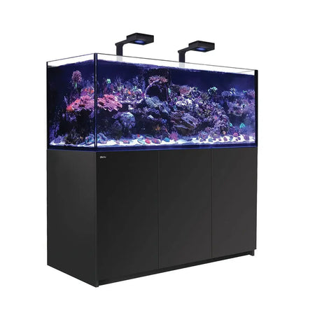Red Sea Reefer G2+ 625 Aquarium with vibrant coral reef and dual LED lights, ideal for hobbyists.