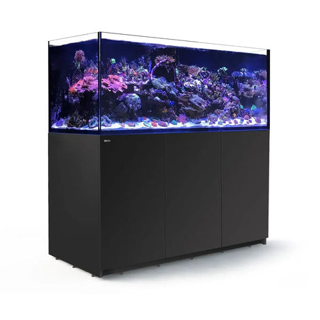Stunning Red Sea Reefer G2+ 750 aquarium with vibrant coral and fish against a sleek black cabinet design.