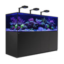 Red Sea Reefer G2+ S1000 aquarium showcasing vibrant coral reef under LED lights.