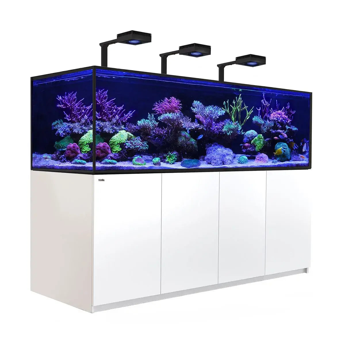 Red Sea Reefer G2+ S1000 Aquarium featuring vibrant corals and sleek white cabinet with LED lighting.