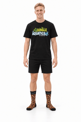 Man wearing Rogz x Versus Safari Socks in Leopard print, black shirt, shorts, ready for a pet walk.