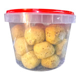 Westerman's Suet Snack Mini Balls in a clear bucket, perfect for attracting wild birds to your backyard.