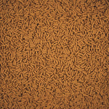 Close-up of Tetra Cichlid Sticks, a high-quality staple food for cichlids and large ornamental fish.