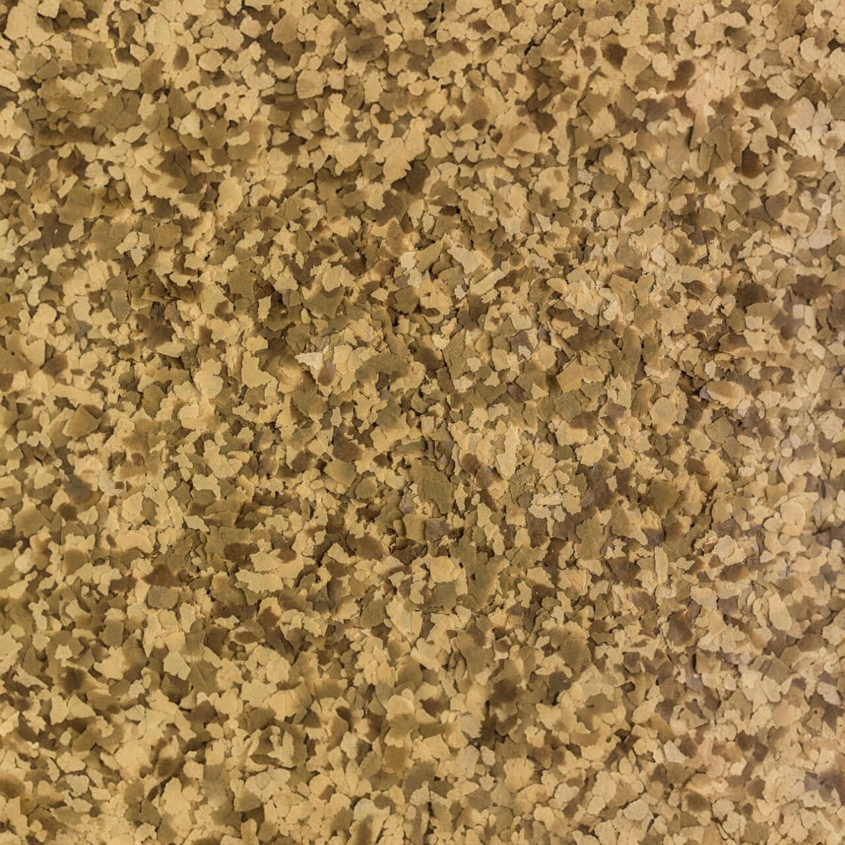 Close-up of Tetra Goldfish Flakes, nutritious flakes for goldfish and coldwater fish, promoting health and vitality.