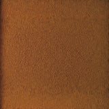 Textured surface in warm brown, resembling earth or clay, ideal for backgrounds or design elements.