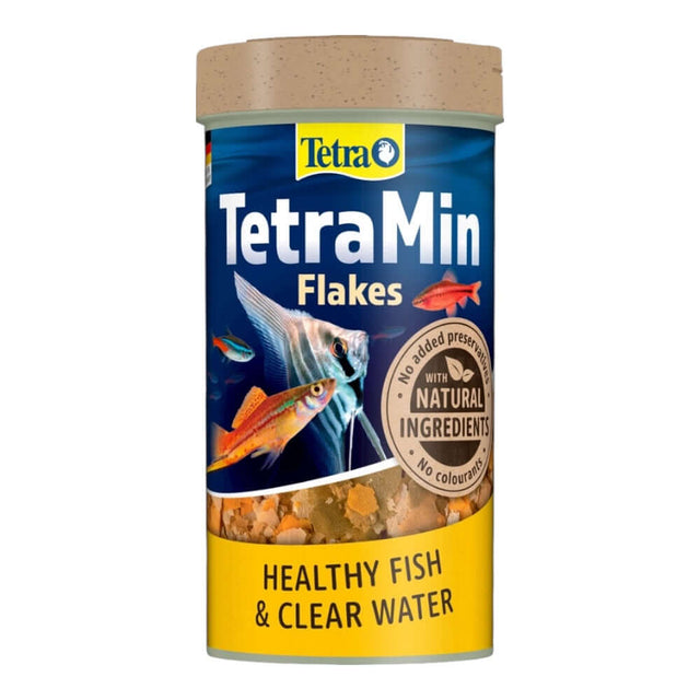 TetraMin Tropical Fish Flakes in a container, promoting healthy fish growth and vibrant colors with natural ingredients.