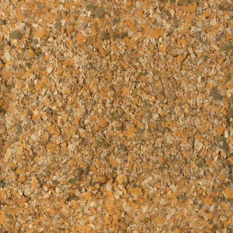 Tetramin Tropical Flakes for ornamental fish, offering a high-quality mix of nutrients for growth and vibrant color.