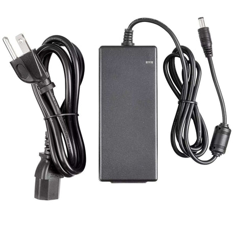 Black power supply unit with cables for electronic devices, including plug and connector.