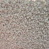 Close-up texture of Aqua Clean Red Cell Filter Media Brick showing its porous ceramic surface for optimal water filtration.