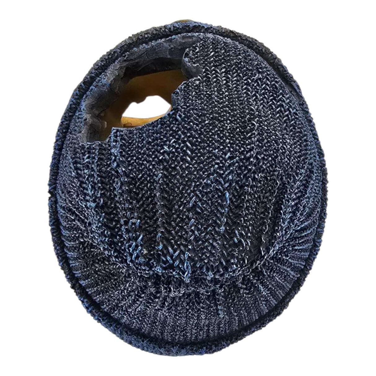 Dark blue knitted beanie with textured detail and a unique torn accent, perfect for adding vintage style.