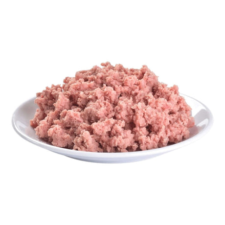 Plate of Brit Premium wet dog food paté, ideal for adult dogs, enriched with meat and easy-to-digest ingredients.