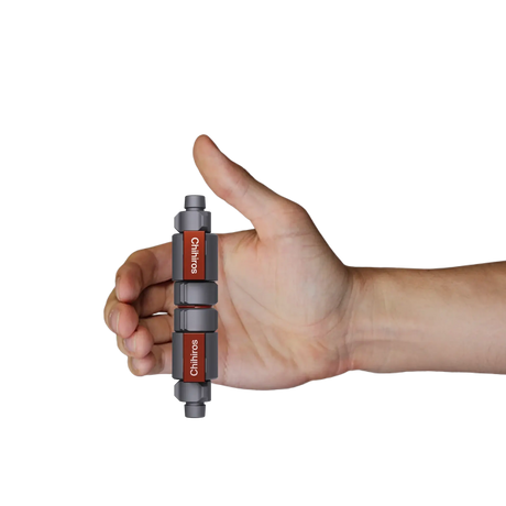Chihiros Double Tap Quick Connector held in hand, showcasing its durable design and quick disconnect feature.