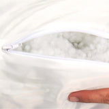 Close-up of Rogz Outdoor Walled Dog Bed zipper revealing plush filling for comfort and durability.