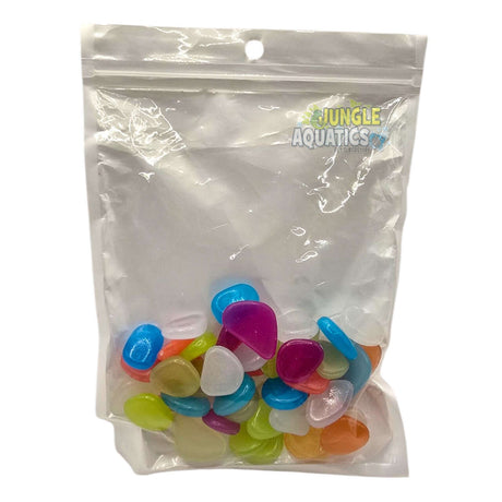 Glow In The Dark Stones in a clear bag with colorful luminous stones for indoor and outdoor decoration.
