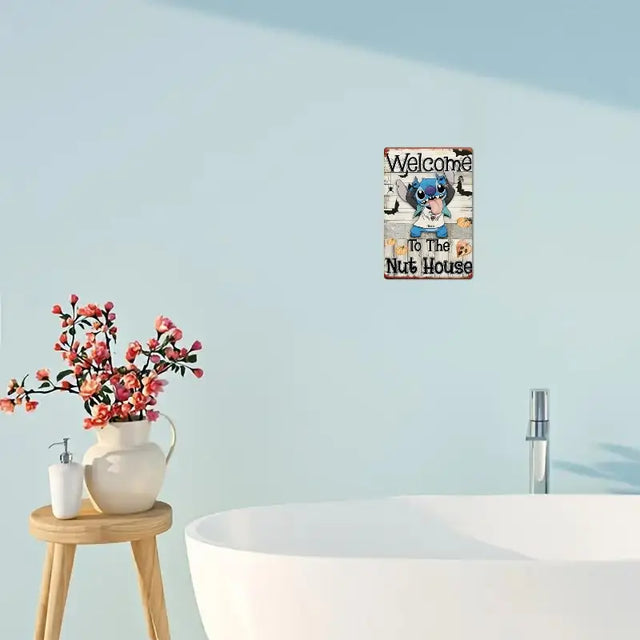Disney Stitch Welcome sign in a bathroom setting, featuring a playful 'Welcome To The Nut House' design.