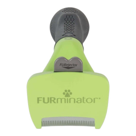 Furminator Dog DeShedding Tool with FURejector button for easy hair removal and stainless steel edge, green design.