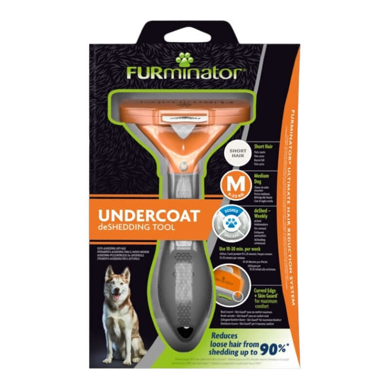 Furminator Dog DeShedding Tool for undercoat, reduces shedding by 90%, stainless steel edge, ergonomic design.