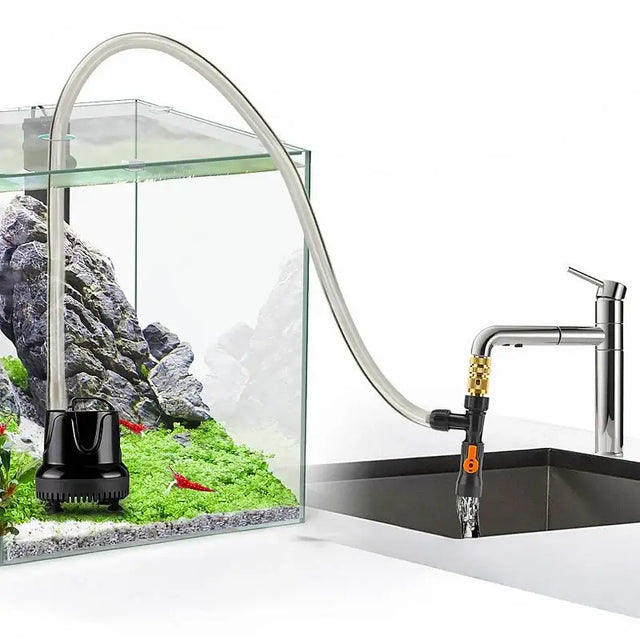 Hygger Auto Gravel Cleaner in action cleaning aquarium with a siphon hose attached to a faucet.
