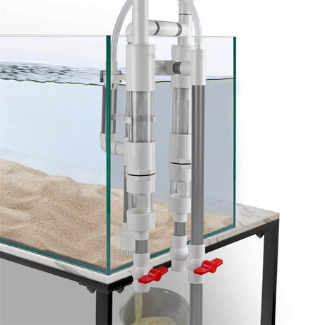 Hygger Fish Waste Collector Red installed on a tank, featuring dual chambers and valves for effective waste separation.