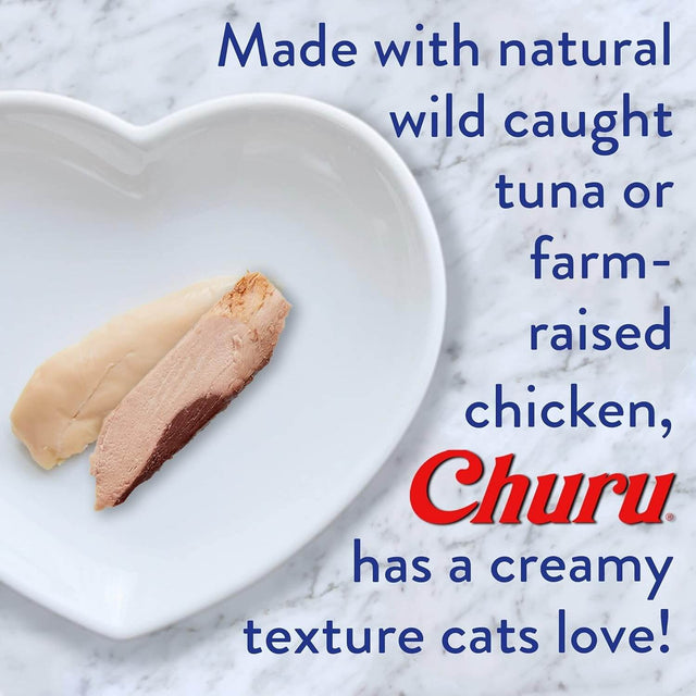 Churu cat treats with creamy texture featuring wild-caught tuna and farm-raised chicken on a heart-shaped plate.