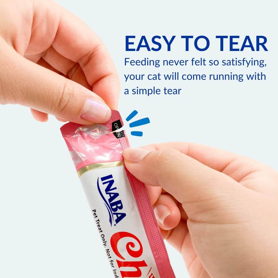 User tearing open an Inaba Churu Skin & Coat Cat Treat package, highlighting its easy-to-tear design.