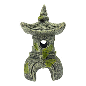 Japanese Pagoda Ornament for aquariums featuring a traditional design with green accents and weathered stone look.