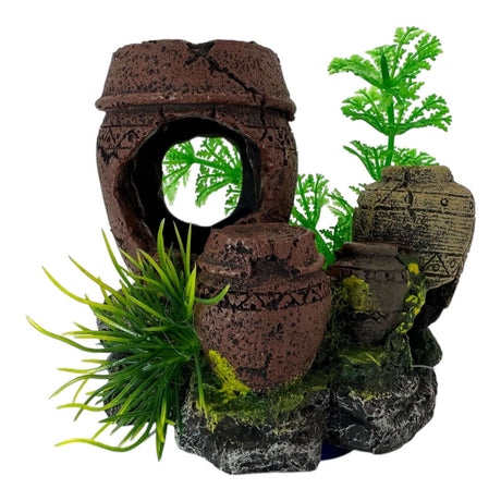 Aquarium ornament featuring jars and vibrant plants on a rock formation, enhancing aquatic landscapes.
