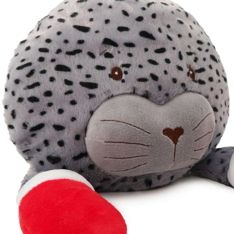 Jolly Jumbo Seal plush toy with a grey spotted design, red accents, and a cute face, perfect for dogs to cuddle and play.
