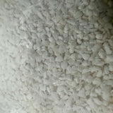 Just Reef Sand 10kg close-up, showcasing fine white grain texture for aquariums.