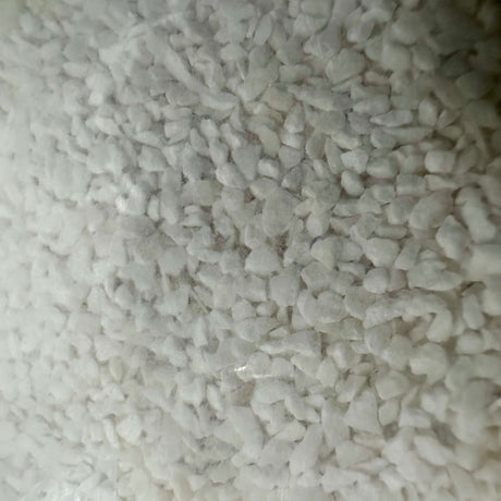 Just Reef Sand 10kg close-up, showcasing fine white grain texture for aquariums.