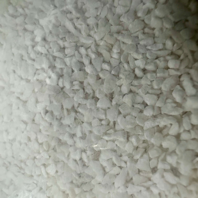 Just Reef Sand 10kg close-up, showcasing fine white grain texture for aquariums.