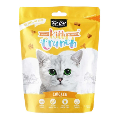 Kit Cat KittyCrunch Cat Treats in chicken flavor, crunchy bites for cats, promotes dental health, 6 tasty options available.