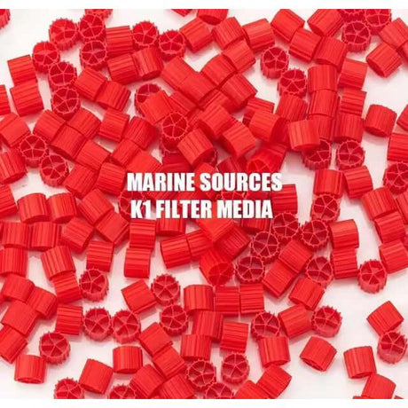 Marine Sources K1 Filter Media in red, ideal for aquarium fish tank filtration and nitrifying bacteria culture.