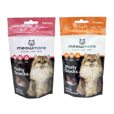 Meow More Meaty Snacks packs featuring Chicken and Salmon flavors for cat treats with high protein content.