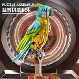 MJI Machinery Parrot 13052 colorful parrot building blocks model displayed in a modern setting.