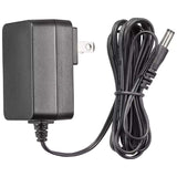 Black power adapter with cord, designed for electronic devices. Compact design with plug for wall outlet.