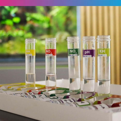 NT Labs Aquarium Lab Multi Test Kit with test tubes for ammonia, nitrite, nitrate, pH, GH and KH in a display rack.
